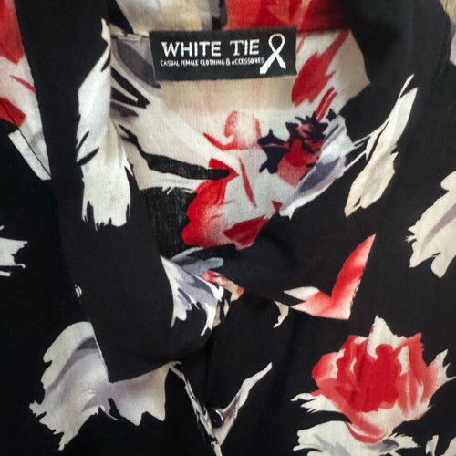 Shirt one size used, long with buttons and thin fabric