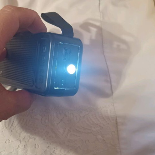 Wireless speaker used with flashlight and solar charging