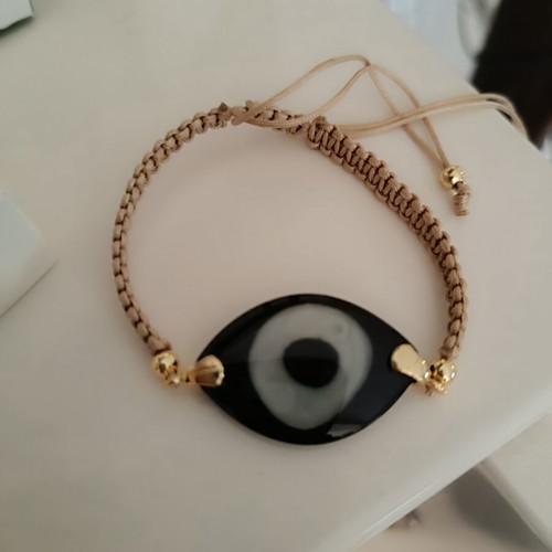 Adjustable eye bracelet like new, black and beige