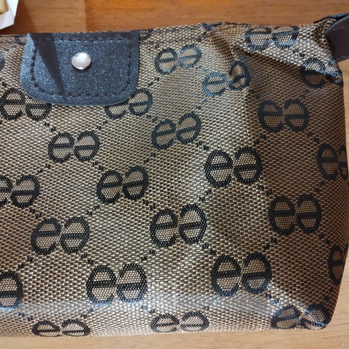 Mini toiletry set with brown-gold cosmetic bag, Apivita soap, Versace Eros Pour Femme sample