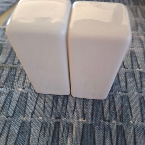Salt and pepper set with Christmas snowman and Santa theme like new