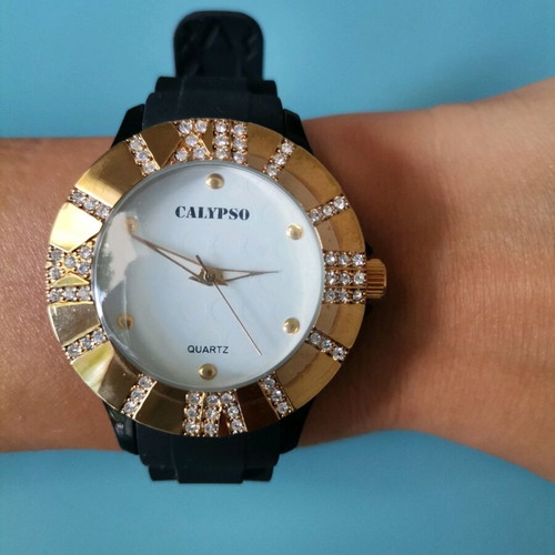 Calypso women's watch like new, black with gold and zircon