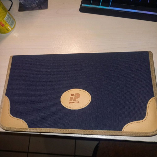 Portable CD-ROM case like new, blue leather, double-sided
