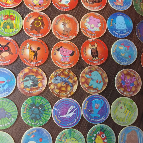 Pokemon tazos set with 36 flat and 5 3D tazos