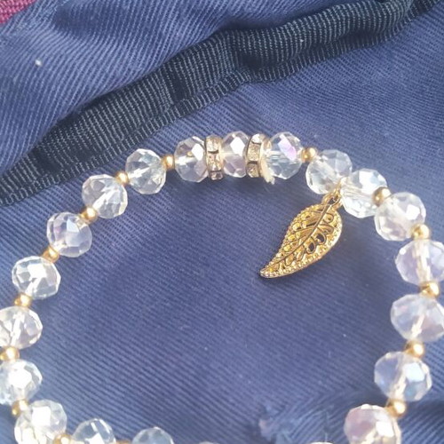 Steel bracelet with crystals new, white and gold details