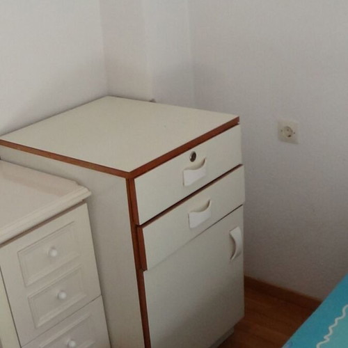 Wooden white drawer cabinet used with two drawers and one cupboard