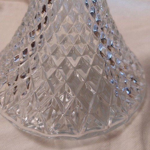 Crystal wine bottle used with silver-plated neck and stopper