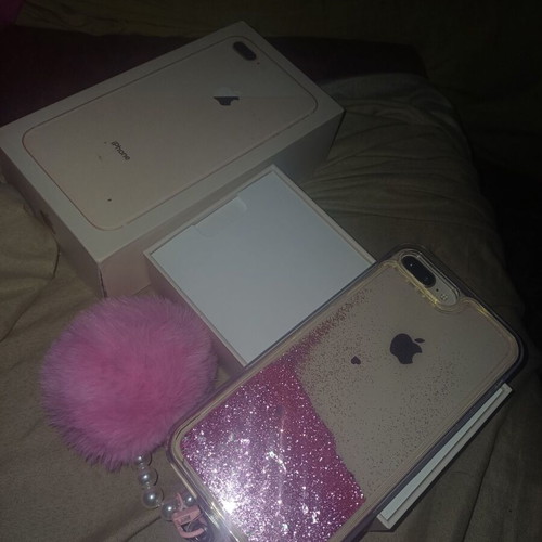 iPhone 8 Plus 64GB used with charger, headphones, 4 cases, 5 screen protectors