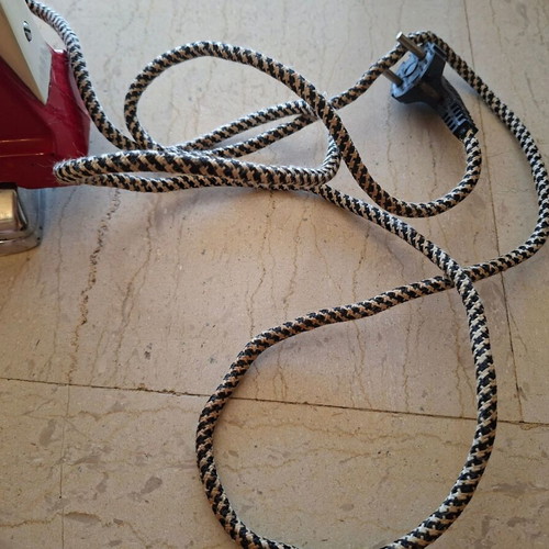 Marconi vintage hand iron used, with plate and cord