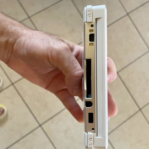 Nintendo 3DS white console with charger and case