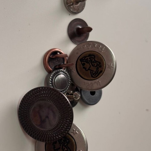 Various green and metal buttons like new