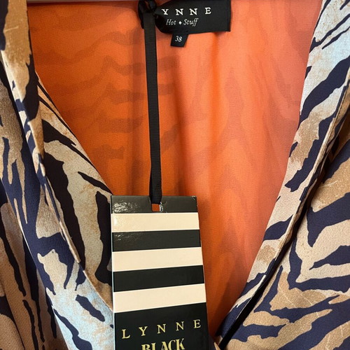 Lynne animal print dress with lining and belt new with tags