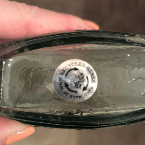 Bottle with cork made of recycled glass like new
