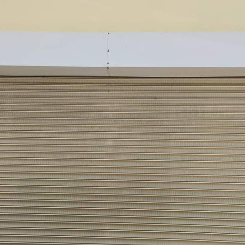Perforated security roller shutters used 4m x 3m height