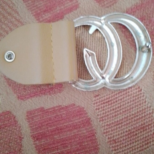 Belt buckle used, mustard color