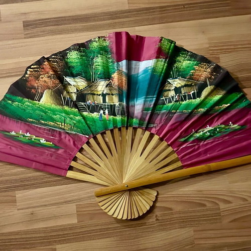 Handmade decorative fan like new, fabric and wood
