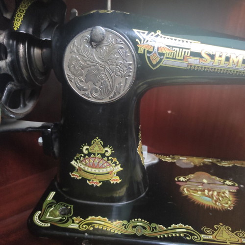 Shmens sewing machine used, antique collectible