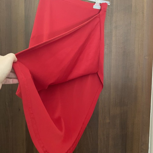 Red midi skirt with asymmetric design by TATU like new