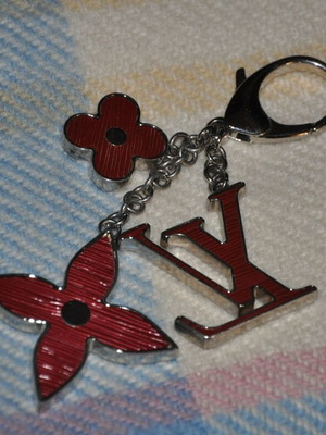 Louis Vuitton bag charm like new