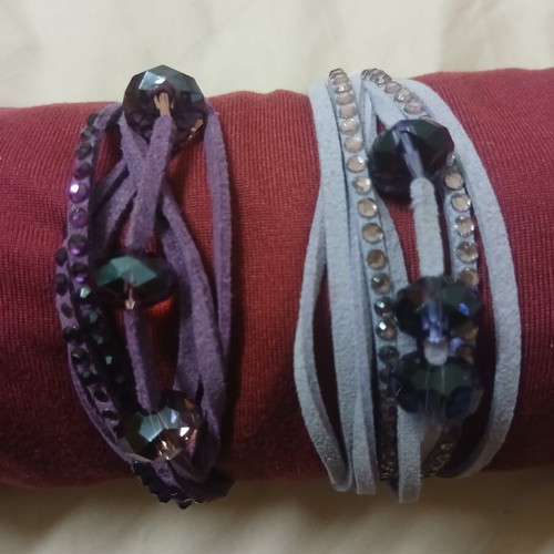 Bracelet set of 2, purple and lilac, like new, missing some rhinestones