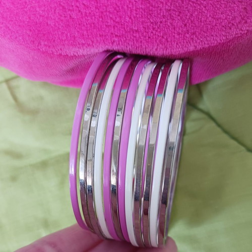 Set of 12 silver, white and pink steel bracelets like new