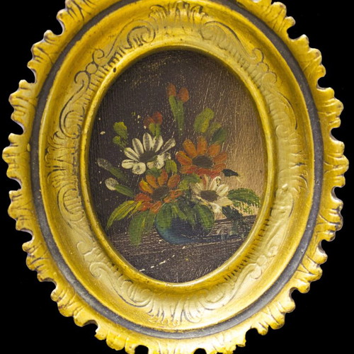 Pair of small oval paintings with embossed gold frames, like new