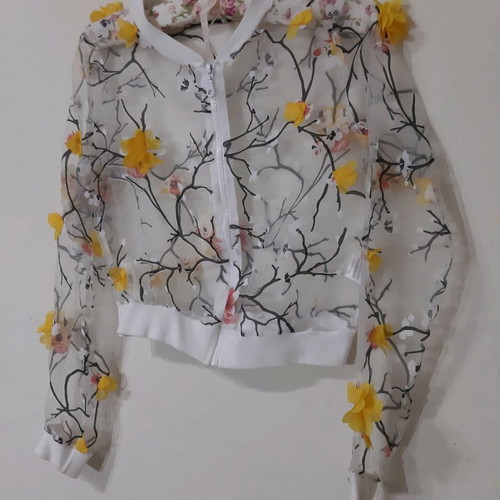 Hyper transparent cardigan with embossed flowers used