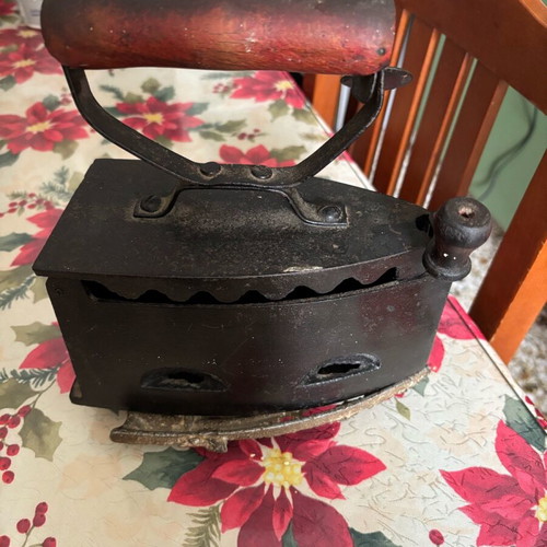 Iron with base and charcoal used