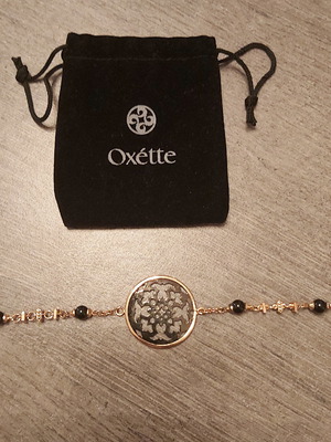 Oxette bracelet black with pink like new
