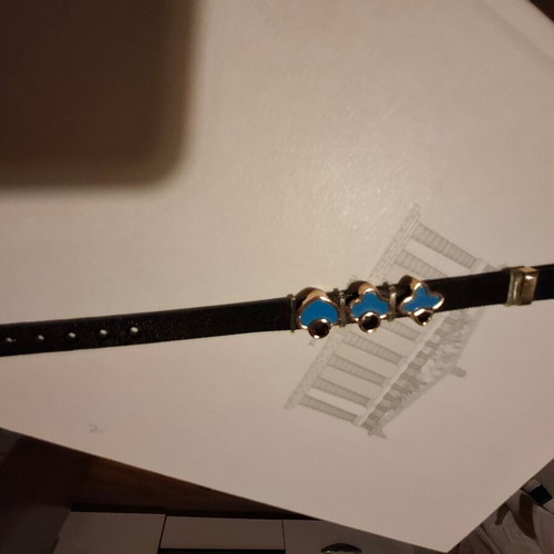 Black bracelet with blue decorations like new