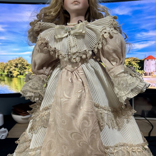 Porcelain vintage doll 46cm