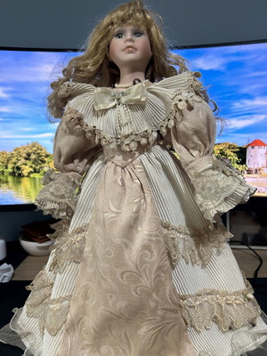 Porcelain vintage doll 46cm