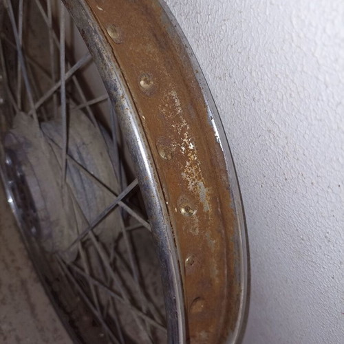 Motorcycle rim used, old with surface rust and missing spoke