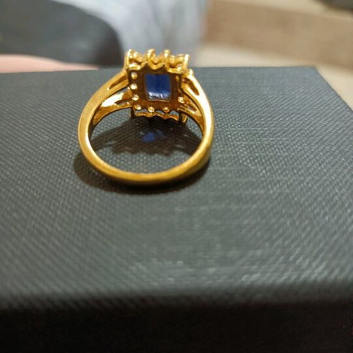 Gold-Plated Ring with Blue Stone and Elegant Setting