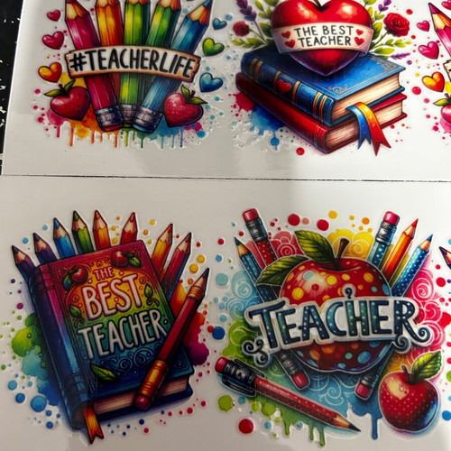 Mugs new with best teacher sticker, set of 2