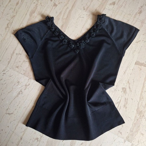 Black blouse new with decorative organza roses neckline, size M