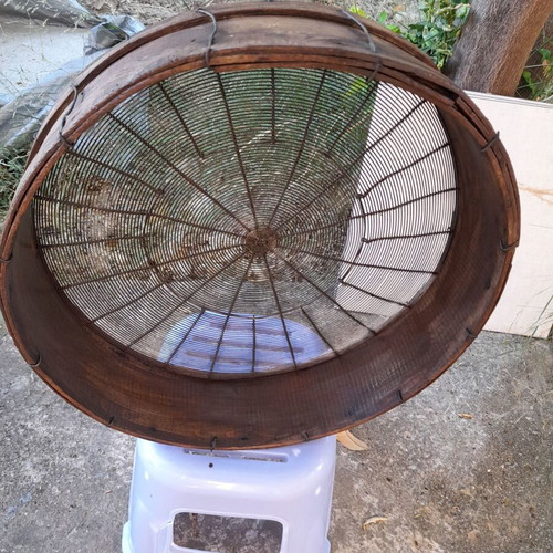 Handmade antique sieve with wooden frame and metal mesh