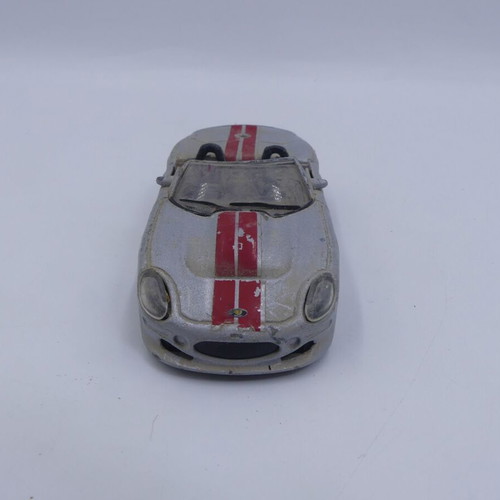 Ford Shelby Series 1 Burago Street Fire 1/43 used, silver with red stripes