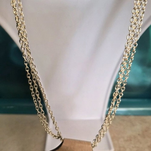 Triple layered necklace new in gold tone Ozze