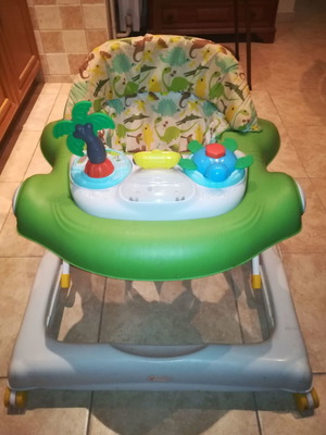 Walker used with adjustable height and toys
