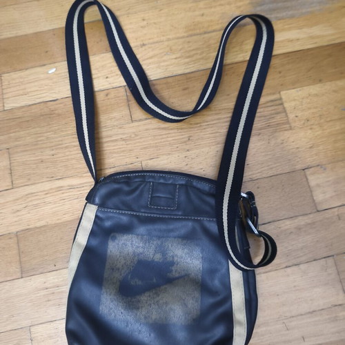 Nike shoulder bag used, black and gold with logo imperfections