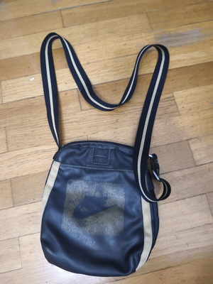 Nike shoulder bag used, black and gold with logo imperfections