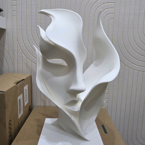 Abstract Face decorative item like new