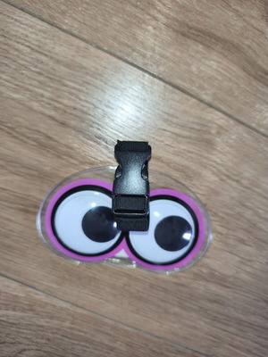 Luggage tag with moving eyes, new