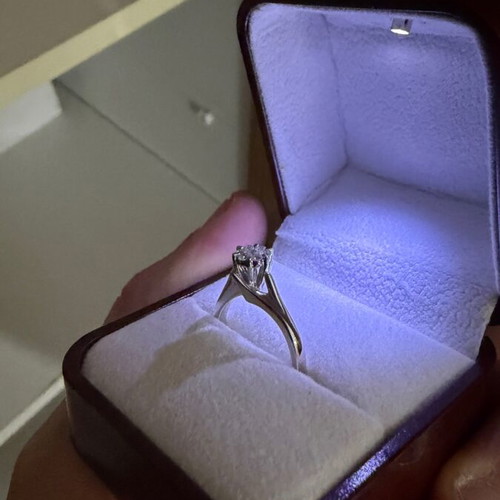 Women's ring new with original wooden box and certificate