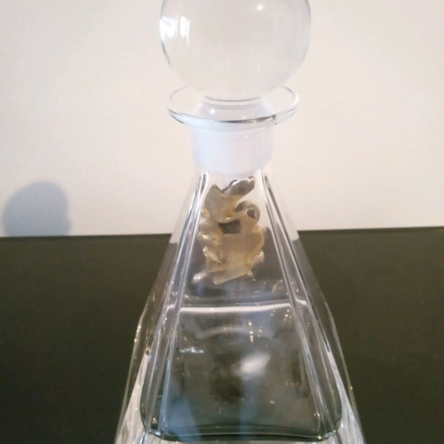 Crystal decorative bottle with silver design like new