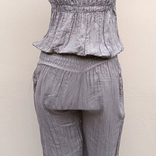 Strapless jumpsuit used, gray brown with bow and ruffles