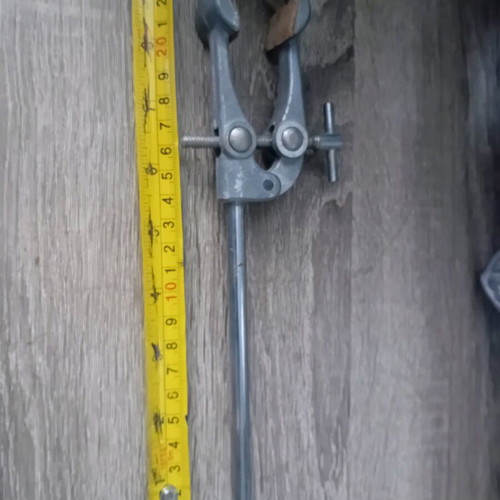 Old laboratory tools used for holding test tubes and bottles
