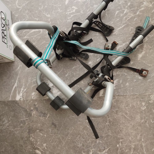 Car bike rack used with three positions and straps for two