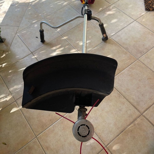Homelite F3055 Petrol Lawn Mower used with accessories